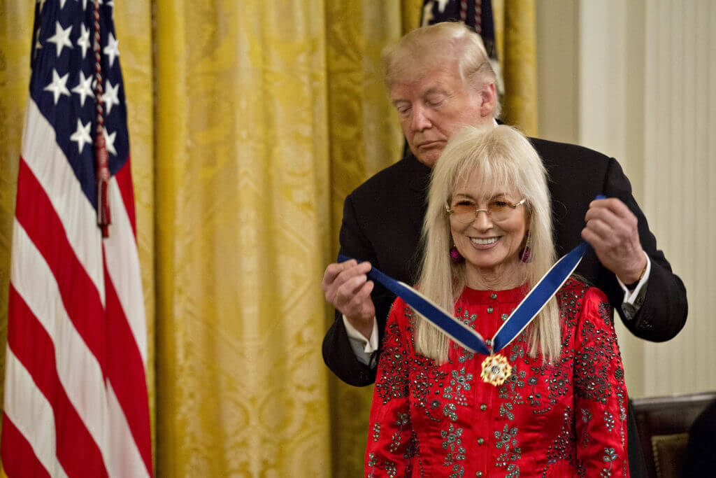 President Donald Trump presents Miriam Adelson, philanthropist and wife of billionaire Sheldon Adelson, with the Presidential Medal of Freedom on Nov. 16, 2018.
