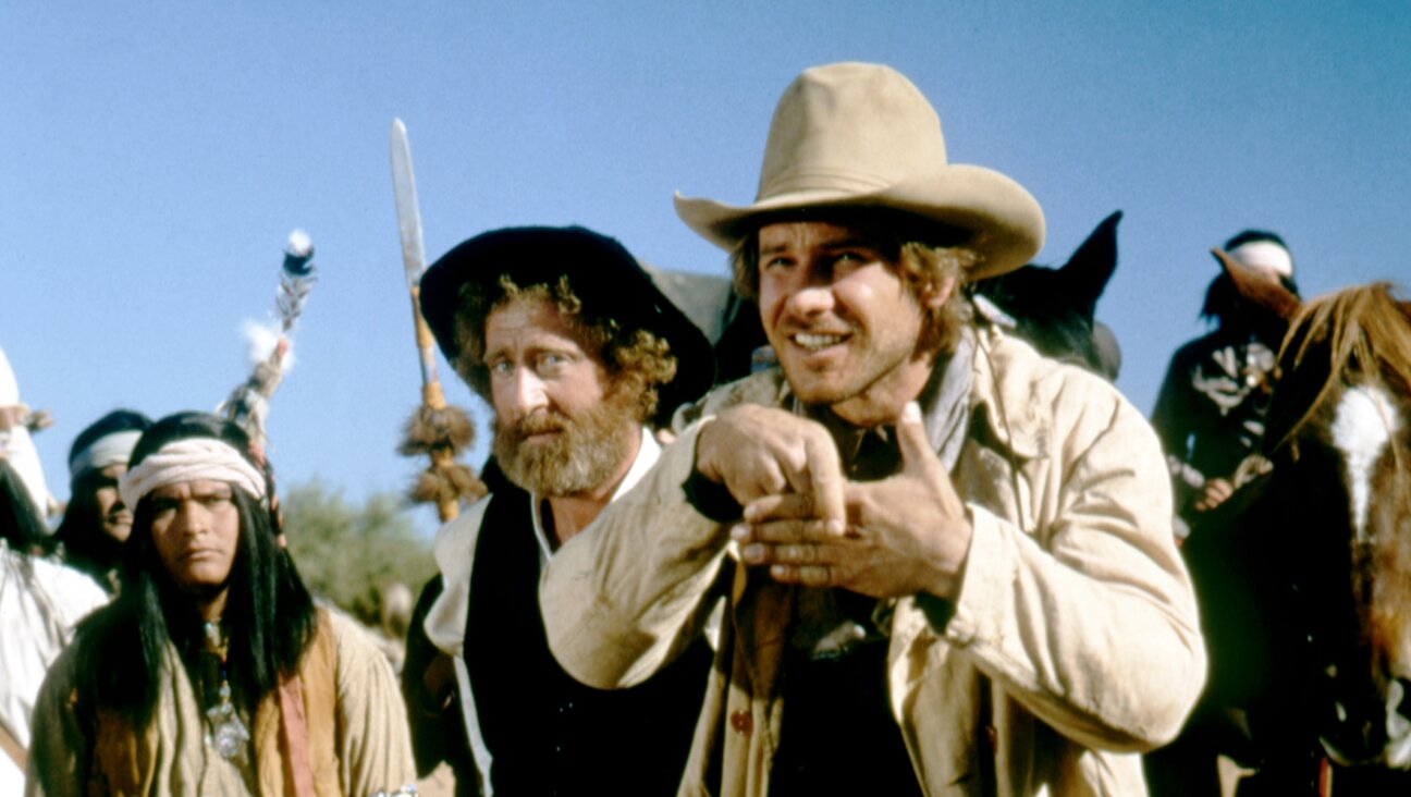 Gene Wilder, center, plays a Polish rabbi in the 1979 film <i>The Frisco Kid</i>, alongside Harrison Ford.