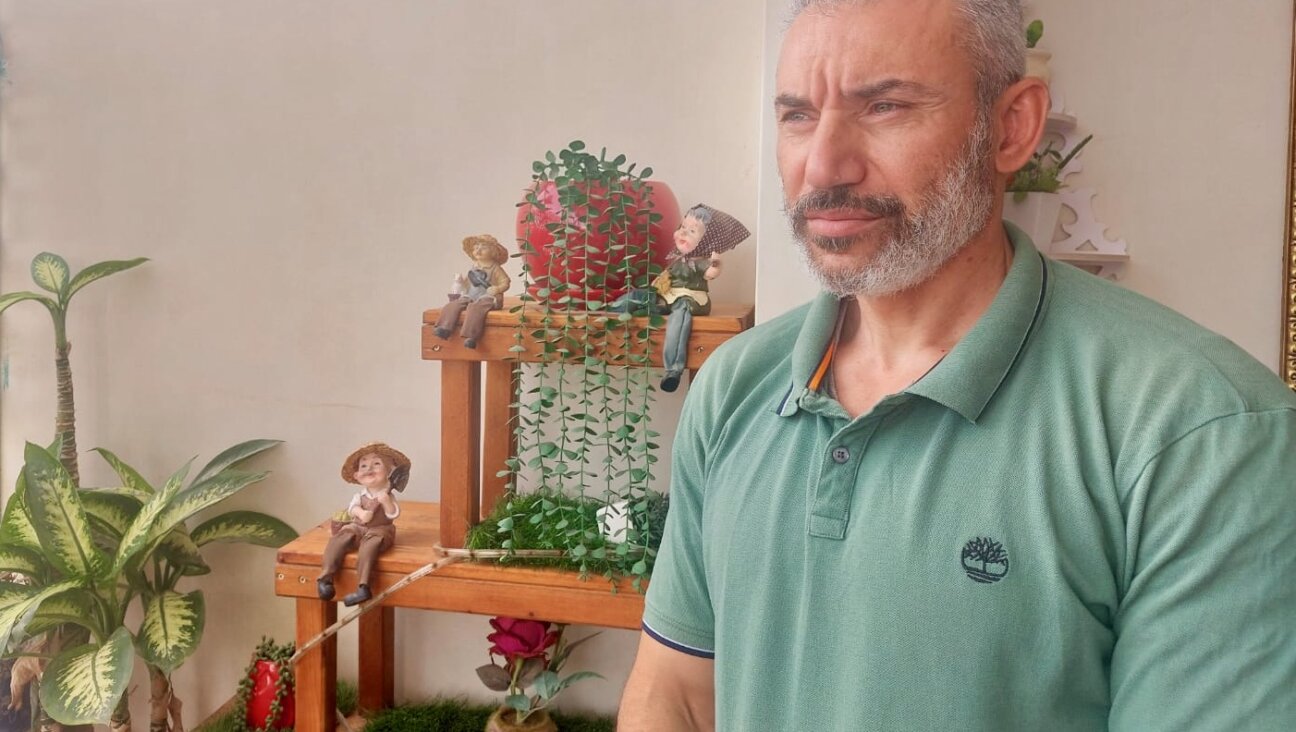 Ahmed Alhelou of Jericho is among the speakers at Israel's joint Israeli-Palestinian Memorial Day ceremony. Israel won't let him enter the country from the occupied West Bank, so he gave his remarks via video.
