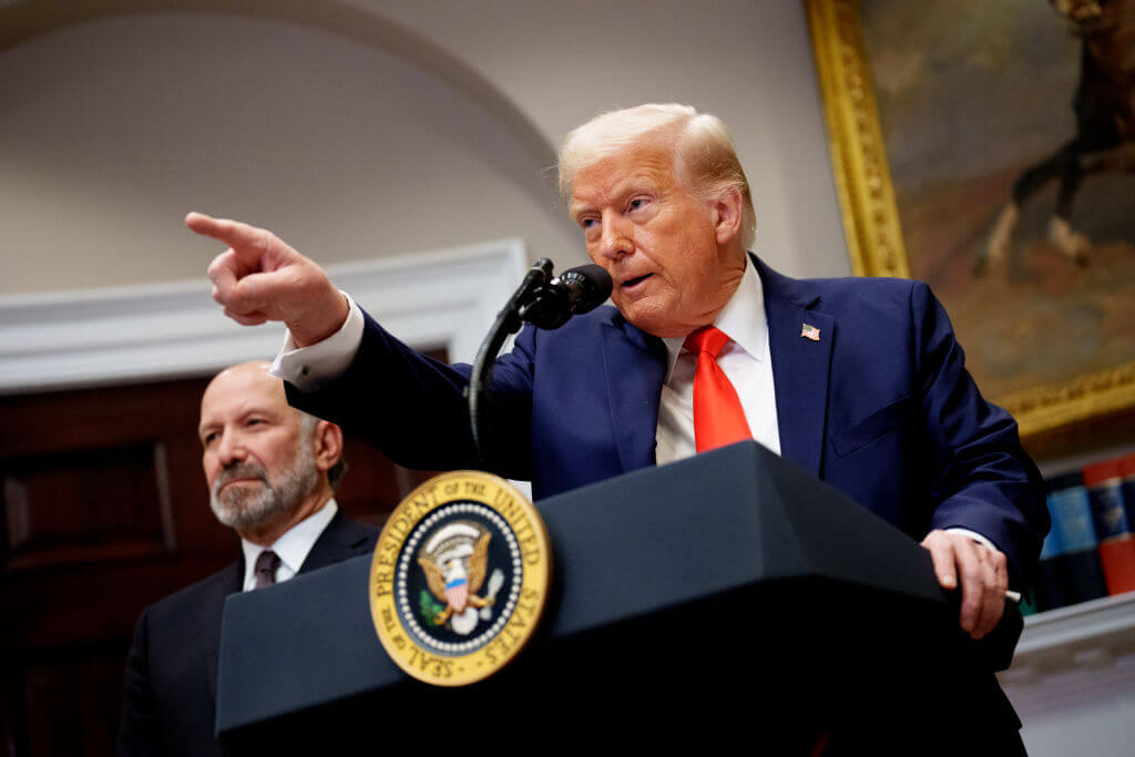 Howard Lutnick, the commerce secretary, and President Donald Trump, take questions from reporters at the White House on March 3, 2025.