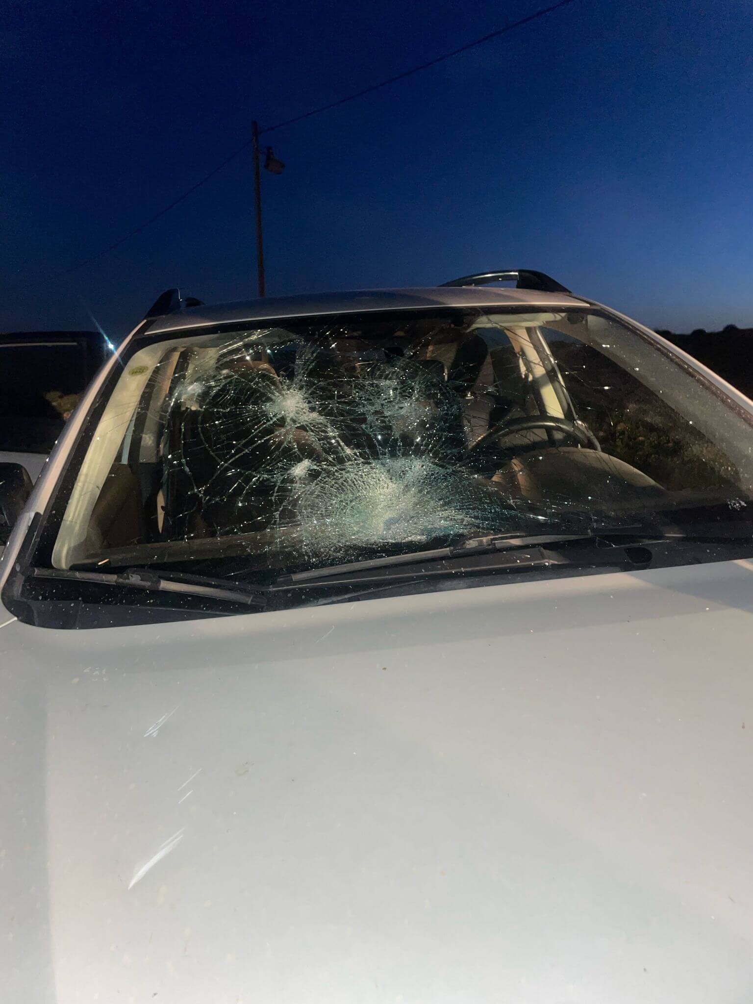BROKEN FRONT WINDSHIELD CAR