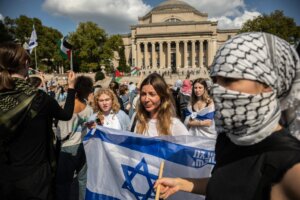 Students protest against the war in Gaza and in support of Israel on the anniversary of the Hamas attack on Israel at Columbia University in New York, New York, on Monday, October 7, 2024. One year ago today Hamas breached the wall containing Gaza and attacked Israeli towns and military installations, killing around 1200 Israelis and taking 250 hostages, and sparking a war that has over the last year killed over 40,000 Palestinians and now spilled over into Lebanon. Photographer: Victor J. Blue for The Washington Post via Getty Images