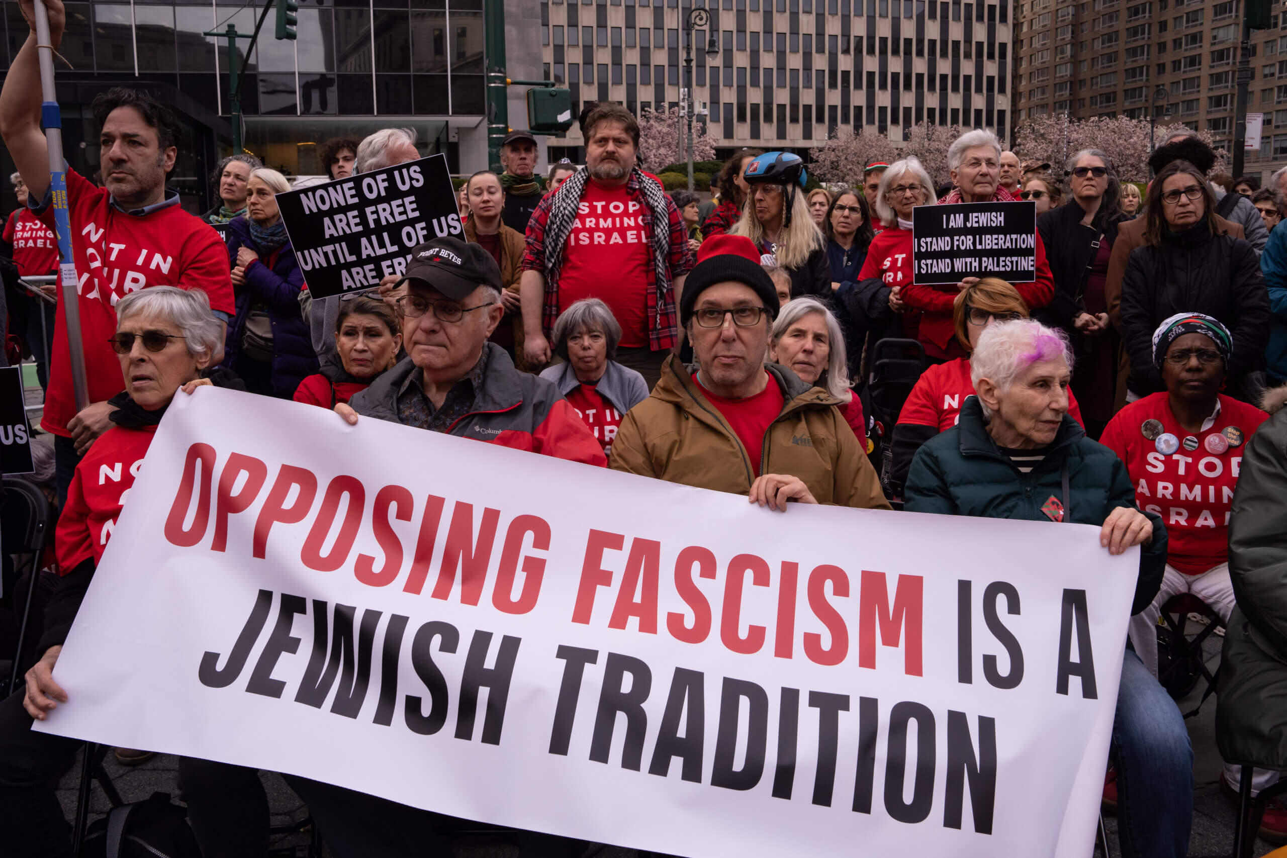 Demonstrators from  Jewish Voice for Peace hold an emergency Passover Seder outside ICE headquarters.