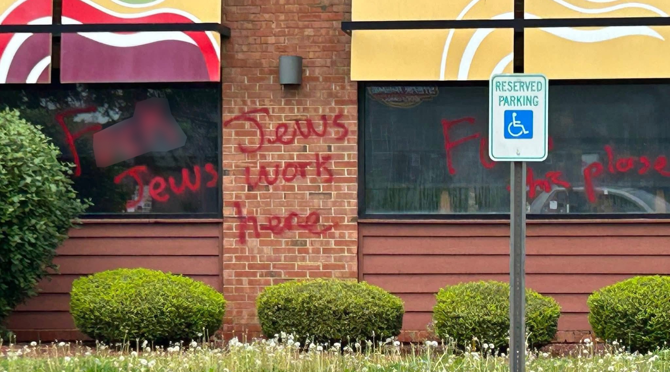 The antisemitic grafitti at an Applebee’s in a suburb of Daytona, Ohio. (Courtesy of April Dunn)