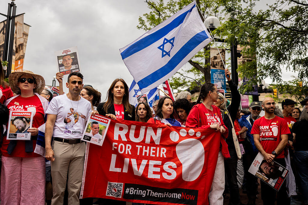 Run for Their Lives hosts a march to raise awareness of the hostages held in Gaza on Sunday in Boulder, Colorado. 
