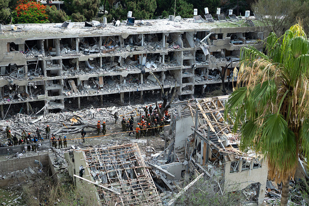Emergency workers respond to the site of a missile strike in the Ramat Aviv neighborhood of Tel Aviv on June 22, 2025 in Tel Aviv, Israel. The country was hit with a fresh wave of aerial attacks by Iran after the US entered the war overnight and bombed several Iranian nuclear sites.